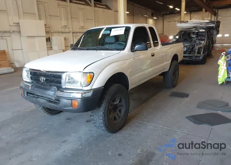 1999 Toyota Tacoma from USA, damaged, VIN 4TAWM72N9XZ476149